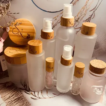 50ml еко зареждащи се дървени крем бутилки Натурална луксозна бамбукова козметична опаковка матирано стъкло спрей бутилка парфюм бамбуков капак